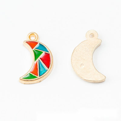 Crescent moon with red, green, and turquoise enamel sections shown in the available finishes