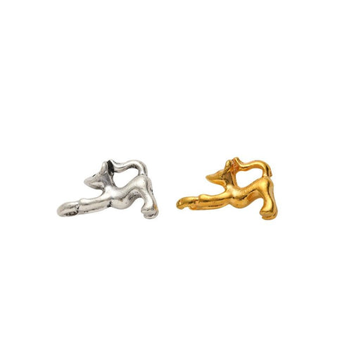 Stretching Cat Charm shown in all pictured finishes on a white background
