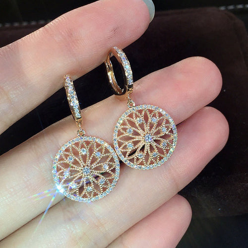 Gold Tone Openwork Filigree Disc Drop Earrings front view