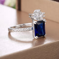 Blue Rectangular Stone Floral Halo Ring in Silver Tone view 4