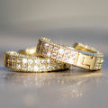 Wide Pavé Huggie Hoop Earrings in Three Metal Tones view 6