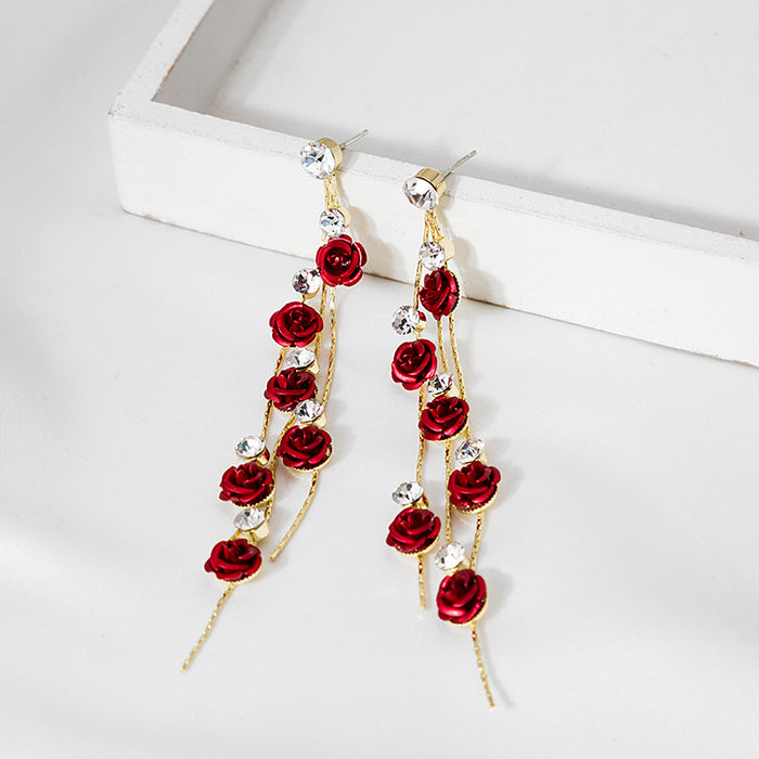 Purple Rose and Clear Accent Gold Tone Long Earrings