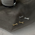 Mini Matte Bow Ribbon Stud Earrings Gold And Silver view 1