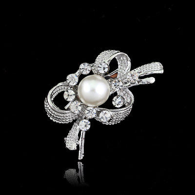 Front product view of the pearl crystal ribbon knot brooch pin in black and silver