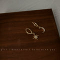 Gold Star and Crescent Moon Huggie Hoop Drop Earrings Pair view 1