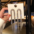 Crystal Arch Tassel Earrings with Sparkling Stone Details view 6