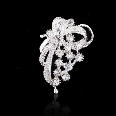 Front product view of the ribbon bow brooch pin in black and silver