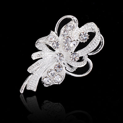 Front product view of the crystal ribbon bouquet brooch pin in black and silver