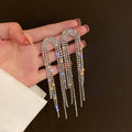 Crystal Arch Tassel Earrings with Sparkling Stone Details view 1