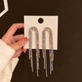 Crystal Arch Tassel Earrings with Sparkling Stone Details view 4