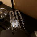 Crystal Arch Tassel Earrings with Sparkling Stone Details view 3