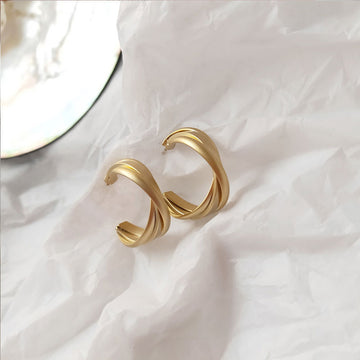 Matte Gold Triple Hoop Earrings with Sculpted Polished Metal Details