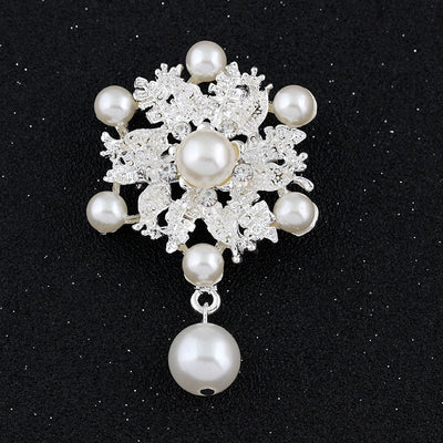 Front product view of the pearl maple leaf cluster brooch pin in black and silver