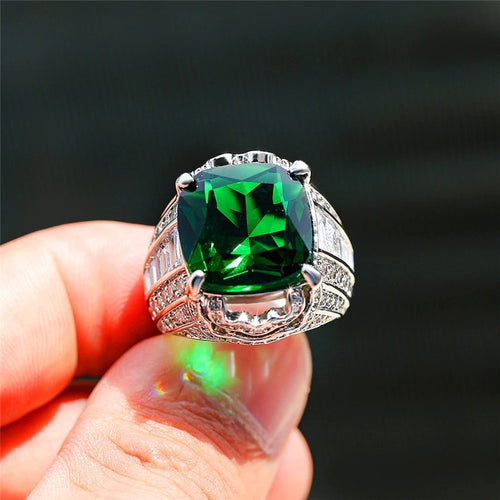 Second product view showing silver-tone oversized green cushion-stone baguette-side ring