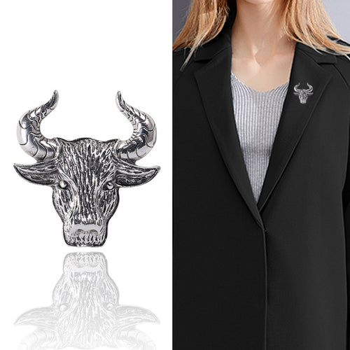 Angled display of detailed bull head with curved horns and a textured face