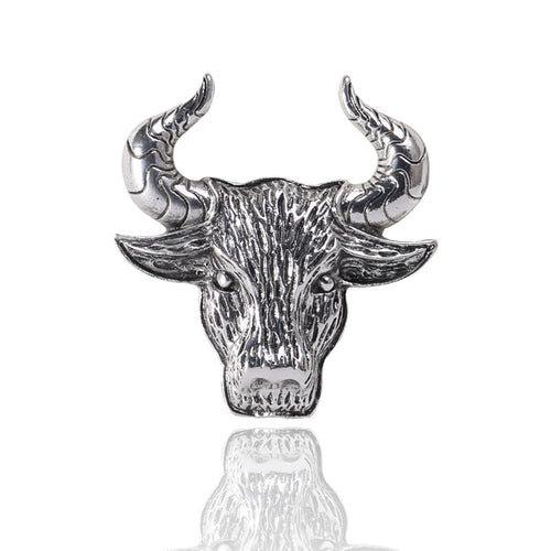 Front view of detailed bull head with curved horns and a textured face