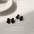 Black Bow Stud Earrings Gold Center Knot Matte Finish view 6