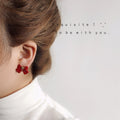 Black Bow Stud Earrings Gold Center Knot Matte Finish view 3