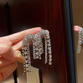 Crystal Arch Fringe Earrings with Sparkling Stone Details view 4