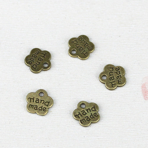 Close product view showing the handmade flower tag details