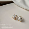 White Enamel Semi-Circle Gold Rim Stud Earrings Pair view 2
