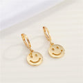 Gold Tone Smiley Angel and Snake Huggie Drop Earrings in Three Designs view 4
