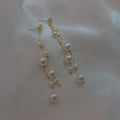 Pearl Chain Tassel Earrings with Lustrous Bead Details view 3