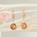 Gold Tone Round Faceted Crystal Huggie Drop Earrings in Four Colors view 4