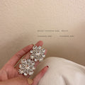 Crystal Flower Stud Earrings with Sparkling Stone Details view 4