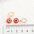 Gold Tone Round Enamel Evil Eye Huggie Drop Earrings in Three Colors view 5