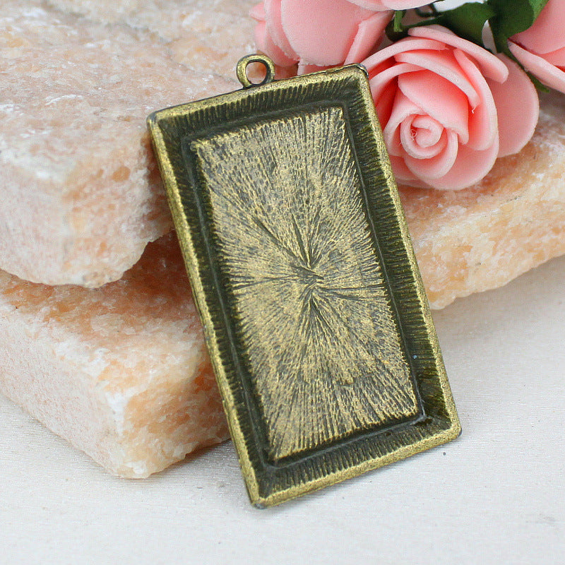 38x19mm Alloy Rectangle Cabochon Tray with Rose Edge