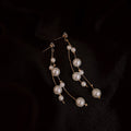 Pearl Chain Tassel Earrings with Lustrous Bead Details view 2