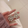 Crystal Flower Stud Earrings with Sparkling Stone Details view 6
