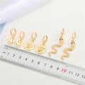 Gold Tone Smiley Angel and Snake Huggie Drop Earrings in Three Designs view 2