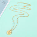 Gold Tone Engraved Angel Coin Pendant Necklace with Round Medallion view 4
