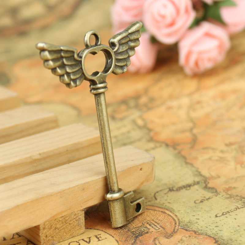 Vintage Alloy Angel Wing Key Charm Pendant