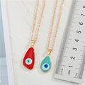 Gold Tone Enamel Evil Eye Pendant Necklaces in Five Drop Shapes view 5