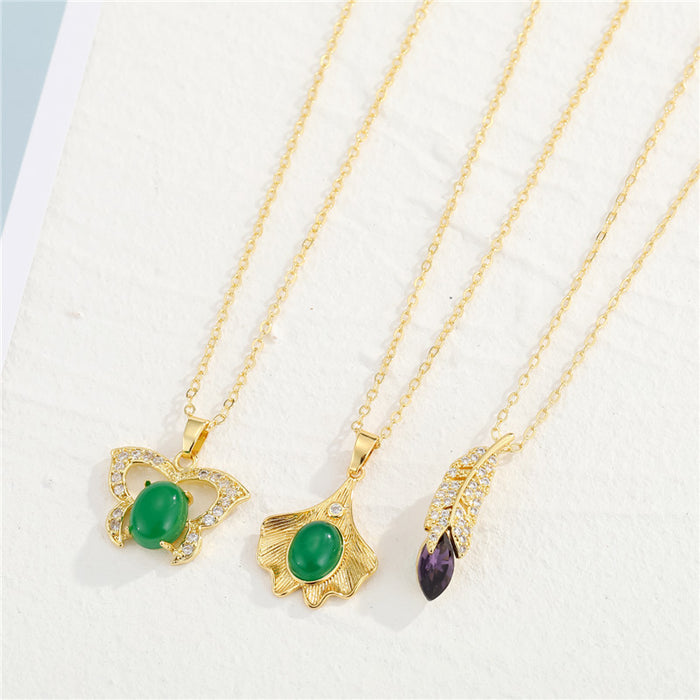 Gold Tone Butterfly, Ginkgo Leaf and Feather Pendant Necklaces