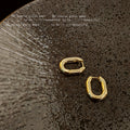Gold-Tone Thick Polished Oval Huggie Hoop Earrings view 6