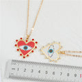 Gold Tone Red and White Heart Evil Eye Pendant Necklaces view 2