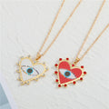 Gold Tone Red and White Heart Evil Eye Pendant Necklaces view 1