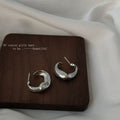 Silver Organic Twisted C Hoop Earrings Irregular Mini Hoops view 4