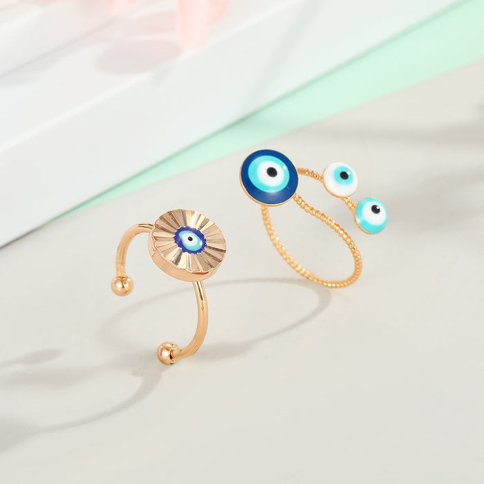 Gold Tone Adjustable Blue Evil Eye Rings in Four Designs