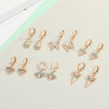 Gold Tone Turquoise-Colored Evil Eye Huggie Drop Earrings in Five Designs view 2