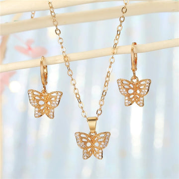 Gold Tone Crystal Butterfly Pendant Necklace and Huggie Earrings
