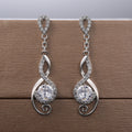 Silver Tone Swirl Drop Earrings with Clear Teardrop Stones view 4