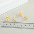Gold Tone Faux Pearl Starfish Stud Earrings with Crystal Accents view 4