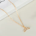 Gold Tone Crystal Whale Tail Pendant Necklace with Fine Chain view 1