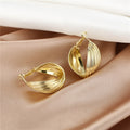 Gold Tone Twisted Multiline Statement Hoop Earrings view 3