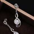 Silver Tone Swirl Drop Earrings with Clear Teardrop Stones view 2
